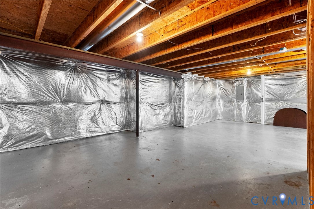 753 Blossom Tree Road Culpeper, VA 22701 - Photo 63 of 68 Unfinished basement space featuring exposed wood j