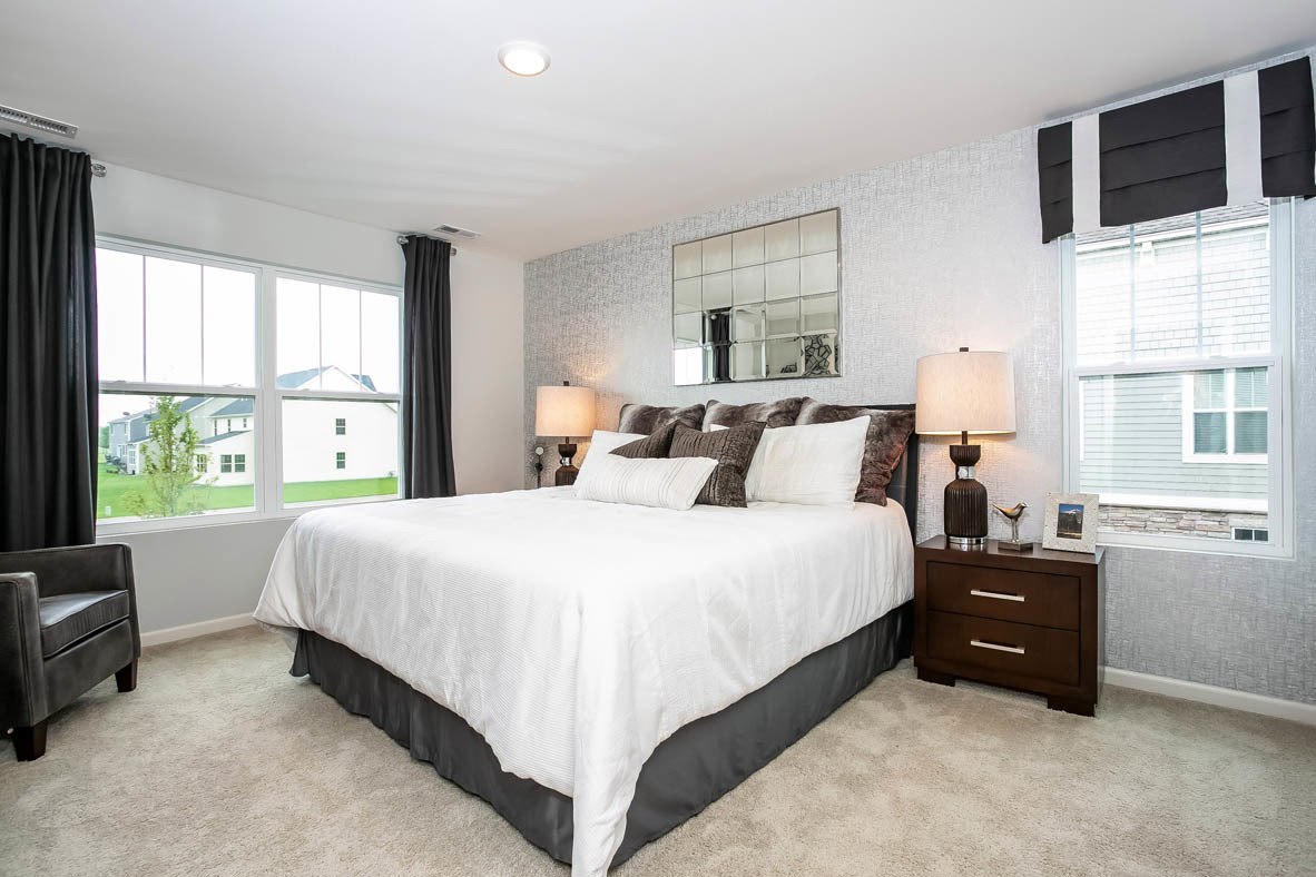 3837 Currant Lane Elgin, IL 60124 - Photo 8 of 10 a bedroom with a bed tv and window