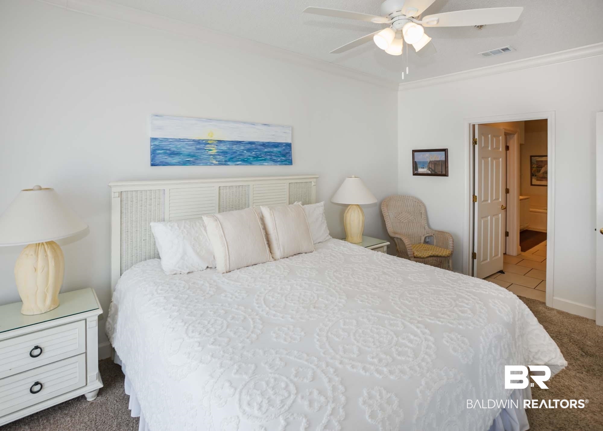 28910 Perdido Beach Boulevard, Unit 4B Orange Beach, AL 36561 - Photo 19 of 48 Carpeted bedroom with ensuite bathroom, visible vents, ornamental molding, and a ceiling fan