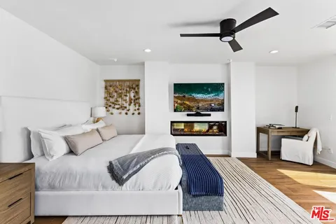 a bathroom with a double vanity sink mirror double and shower