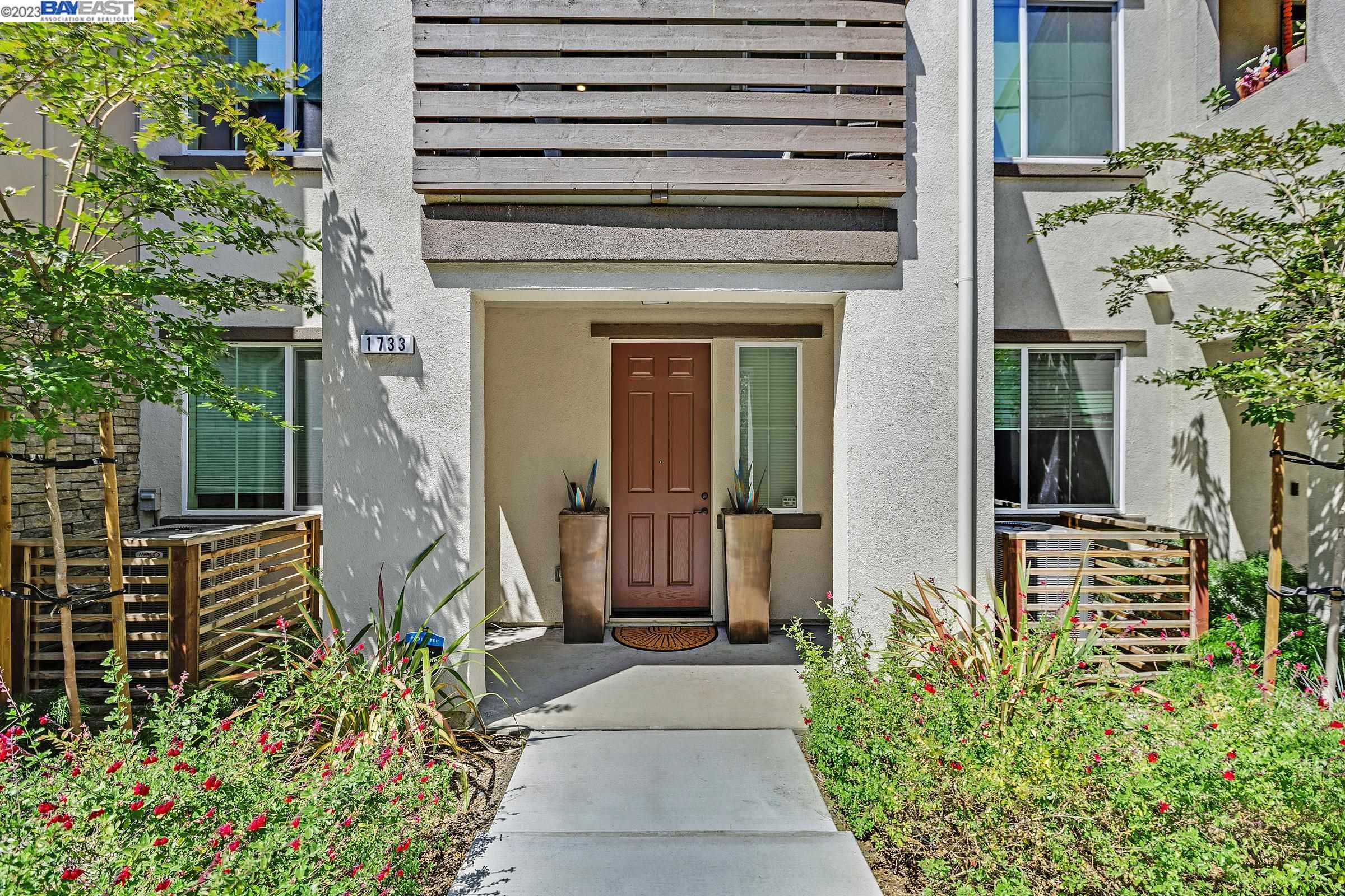 1733 Pedrozzi Common Livermore, CA 94551 - Photo 1 of 1 front view of a house with a yard