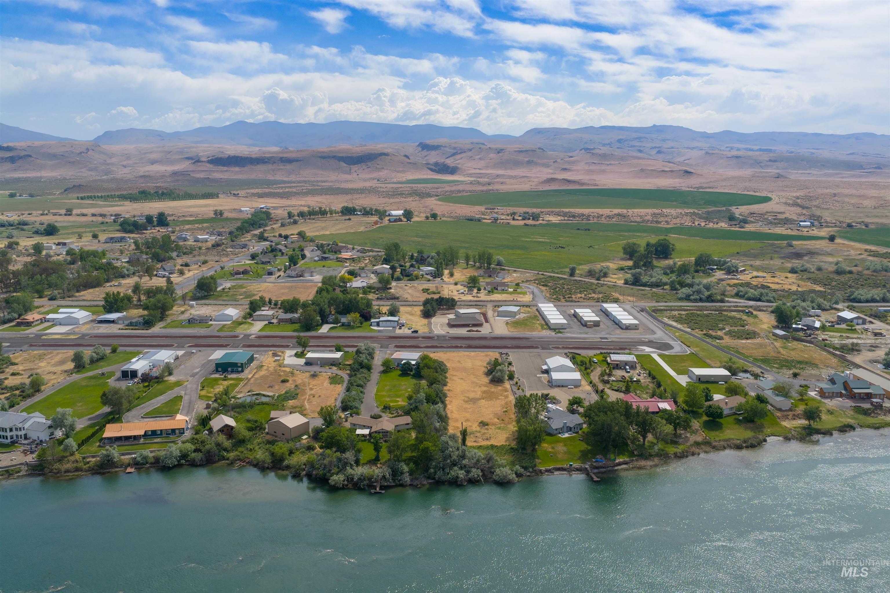 10514 Airpark Loop Road Melba, ID 83641 - Photo 4 of 47 Riverside community featuring diverse residential properties and agricultural fields