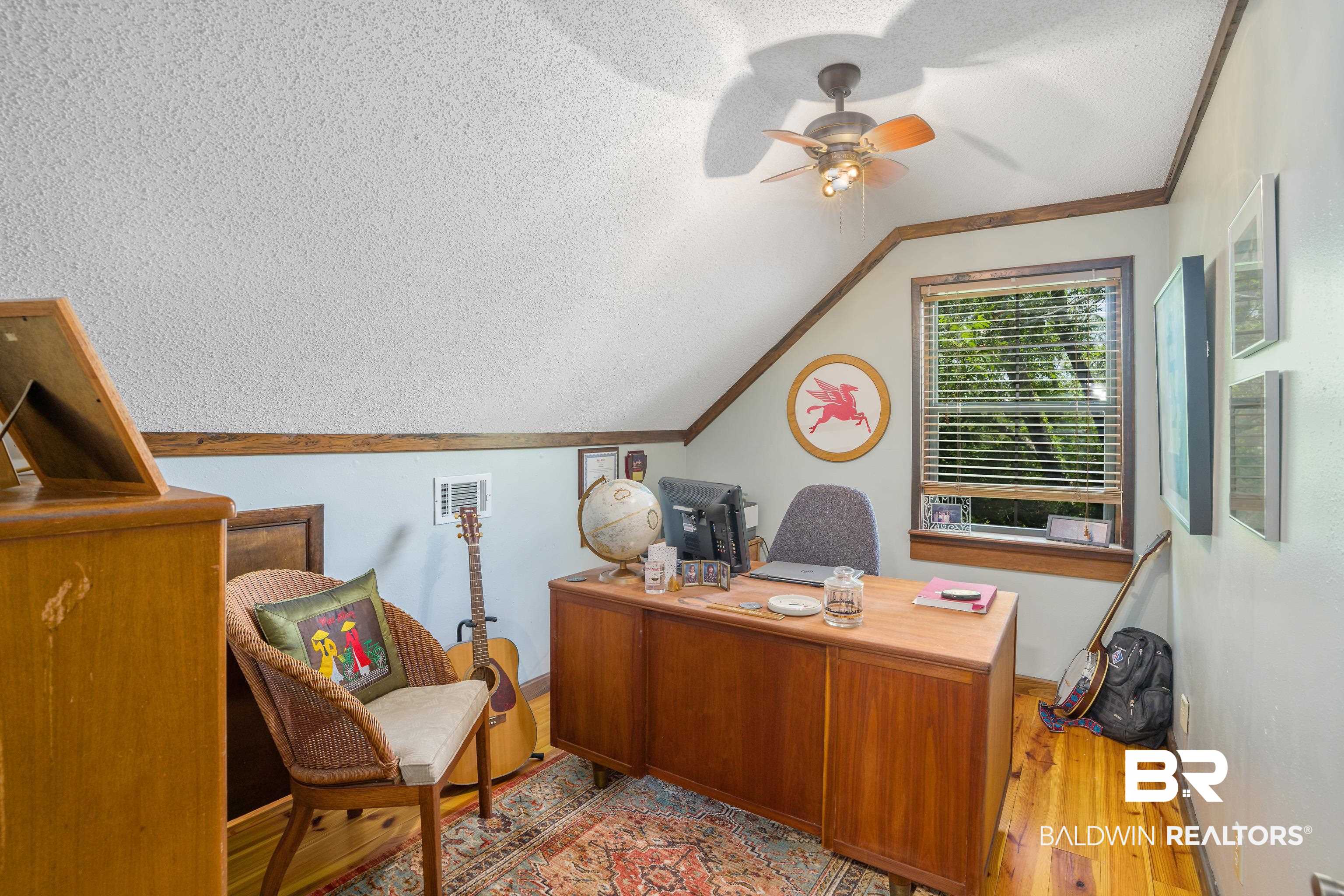 13253 Mary Ann Bch Road Fairhope, AL 36532 - Photo 22 of 54 Office with vaulted ceiling, ceiling fan, hardwood / wood-style flooring, and a textured ceiling