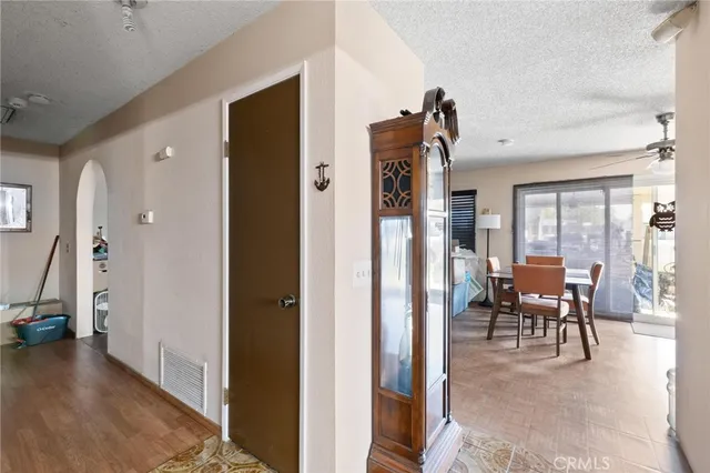 a view of a livingroom with furniture and front door