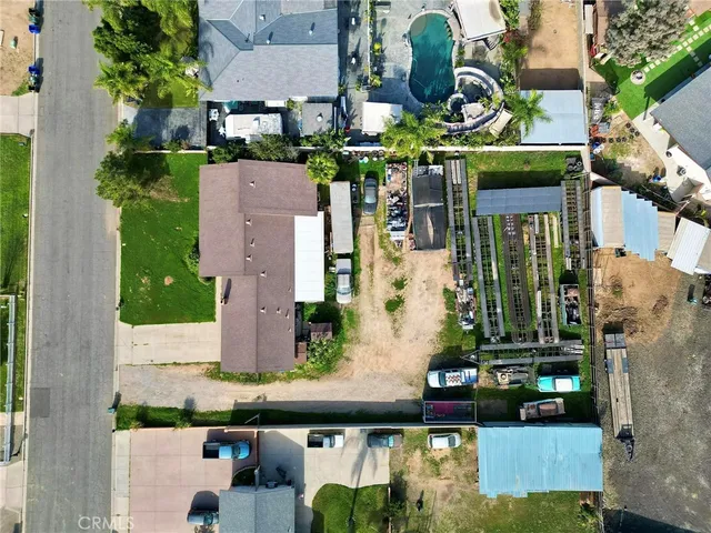 an aerial view of houses and roads
