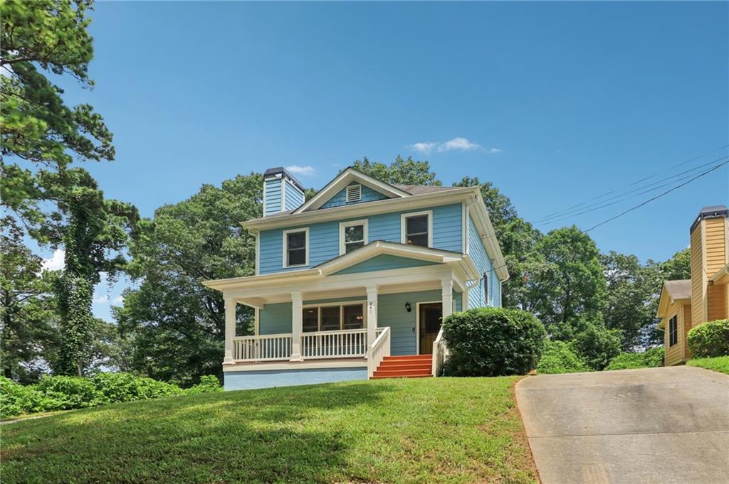941 Capitol View Avenue Northwest Atlanta, GA 30318 - Photo 1 of 1 a front view of a house with a yard