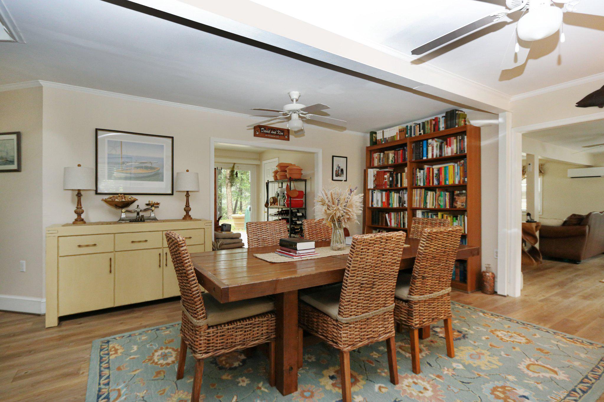 13431 Solitude Trail Machipongo, VA 23405 - Photo 13 of 32 Inviting dining space with cozy charm.