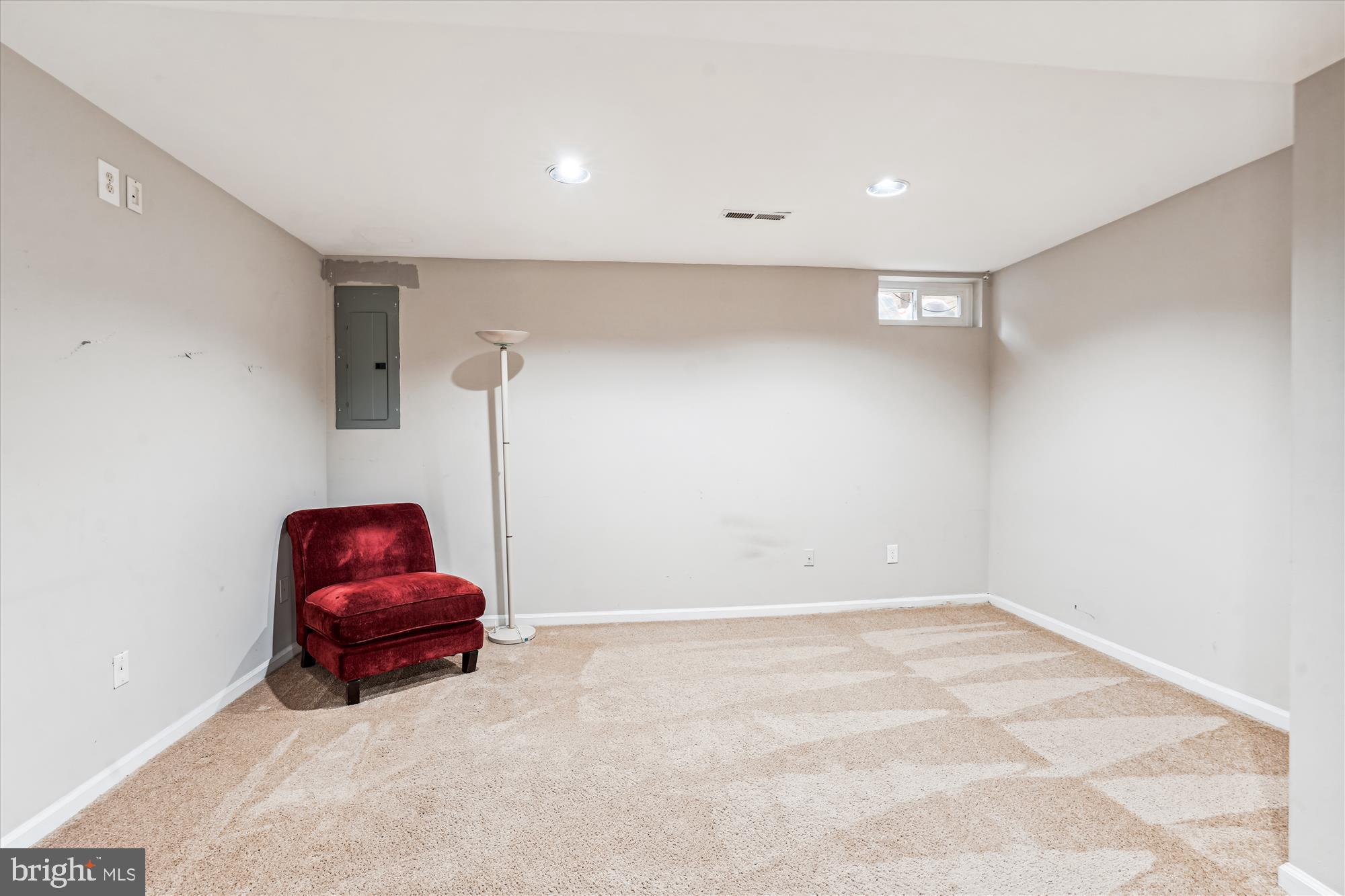 5039 9th Street South Arlington, VA 22204 - Photo 21 of 38 a room with a couch and a dryer