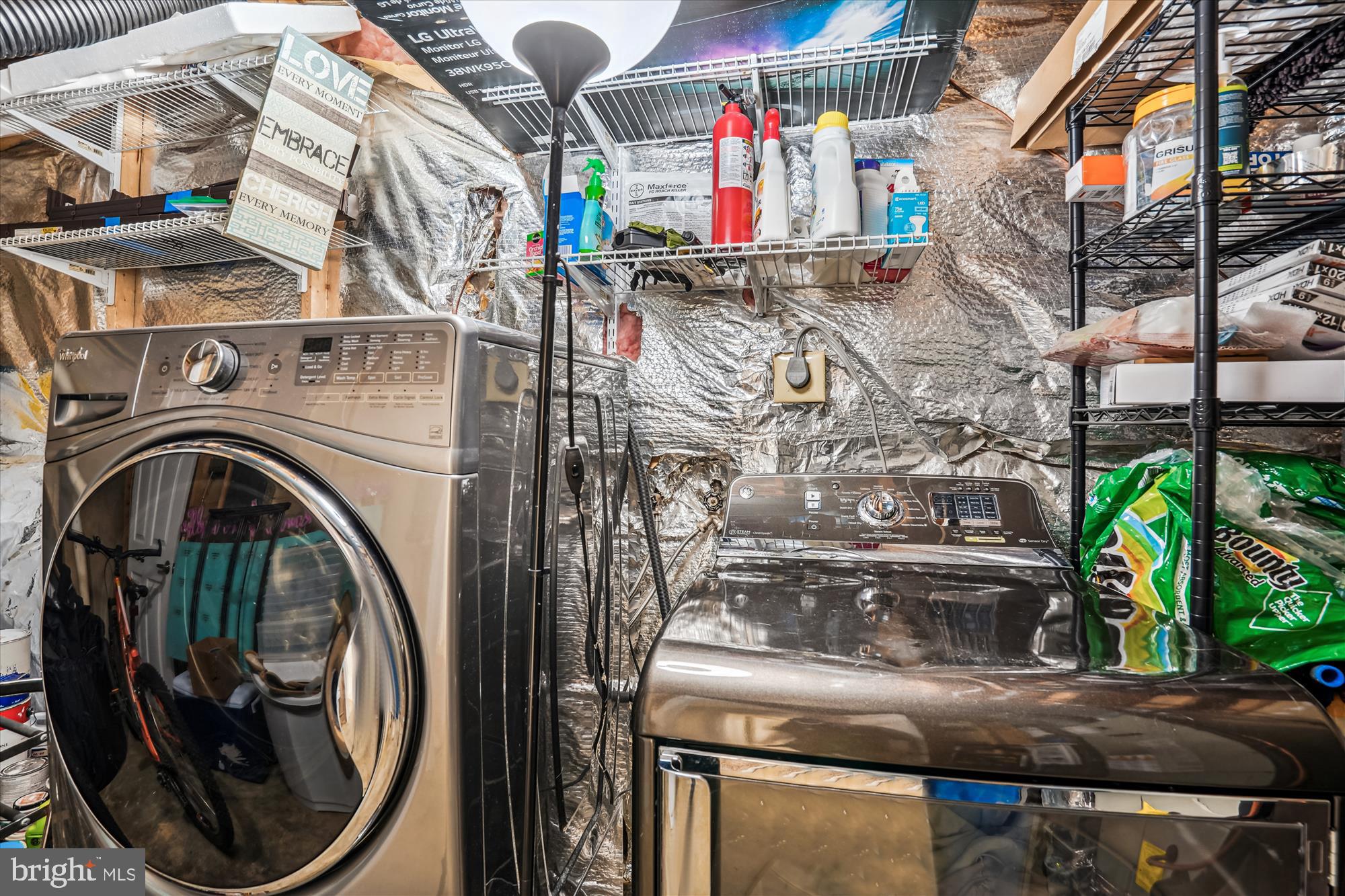 5039 9th Street South Arlington, VA 22204 - Photo 26 of 38 a utility room with lots of clutter and washer