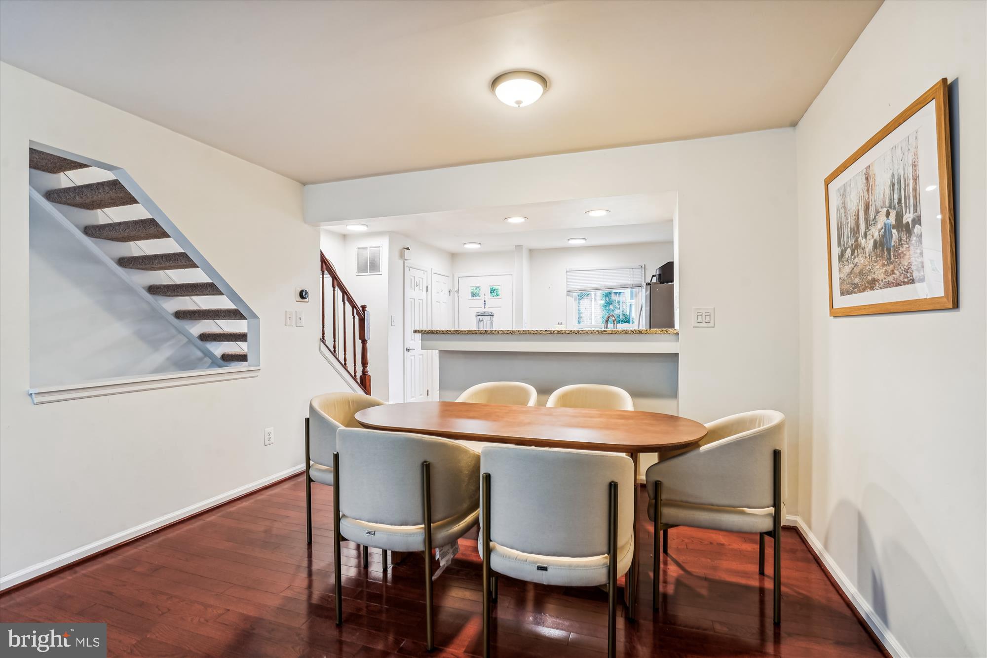 5039 9th Street South Arlington, VA 22204 - Photo 8 of 38 a dining room with furniture and wooden floor