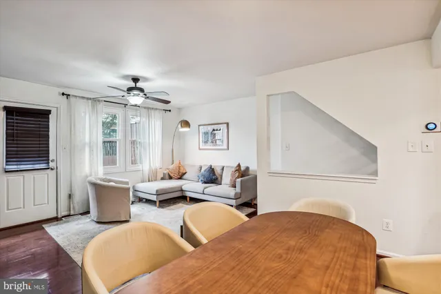 a bedroom with furniture and wooden floor
