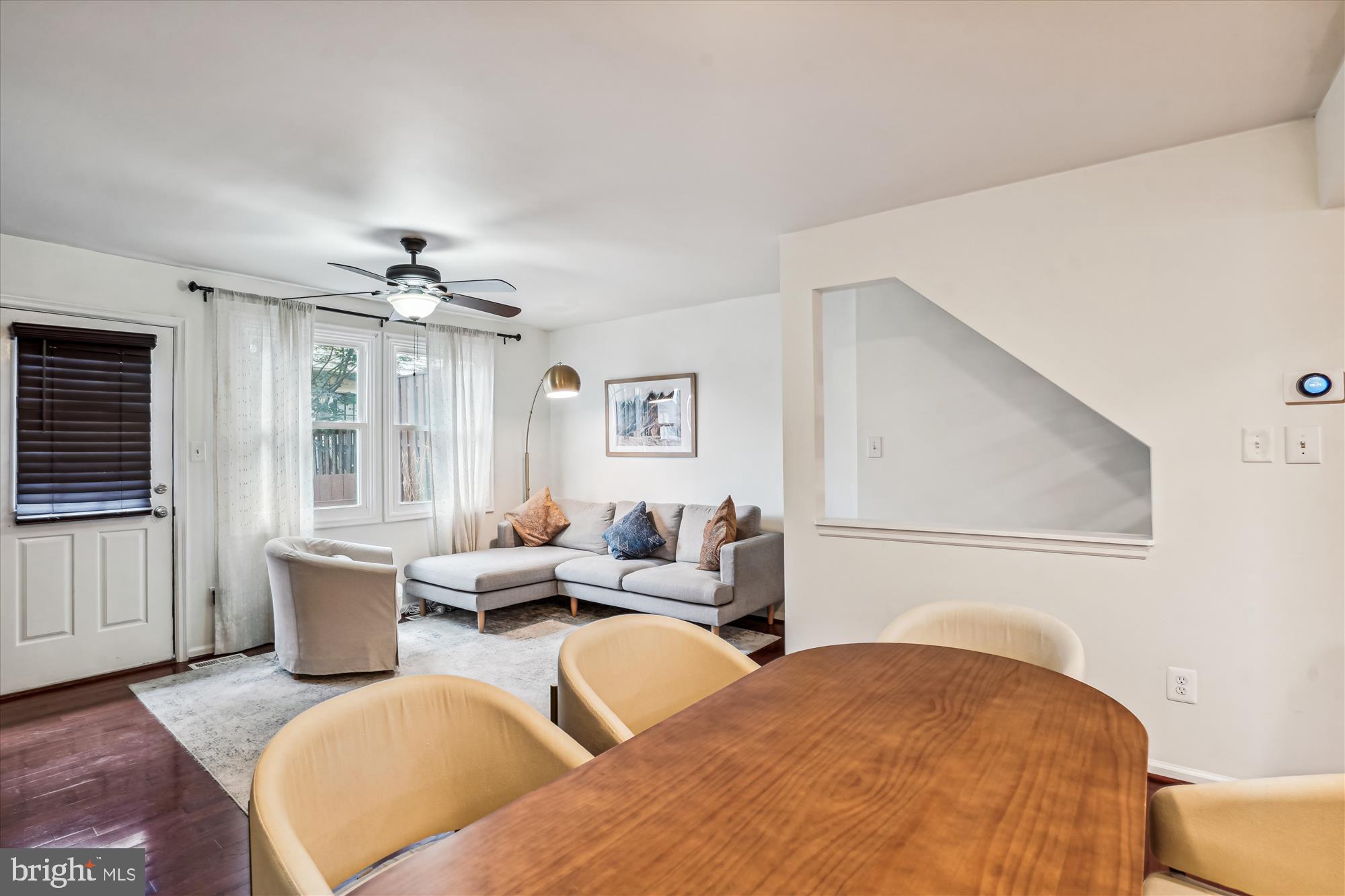 5039 9th Street South Arlington, VA 22204 - Photo 9 of 38 a bedroom with furniture and wooden floor