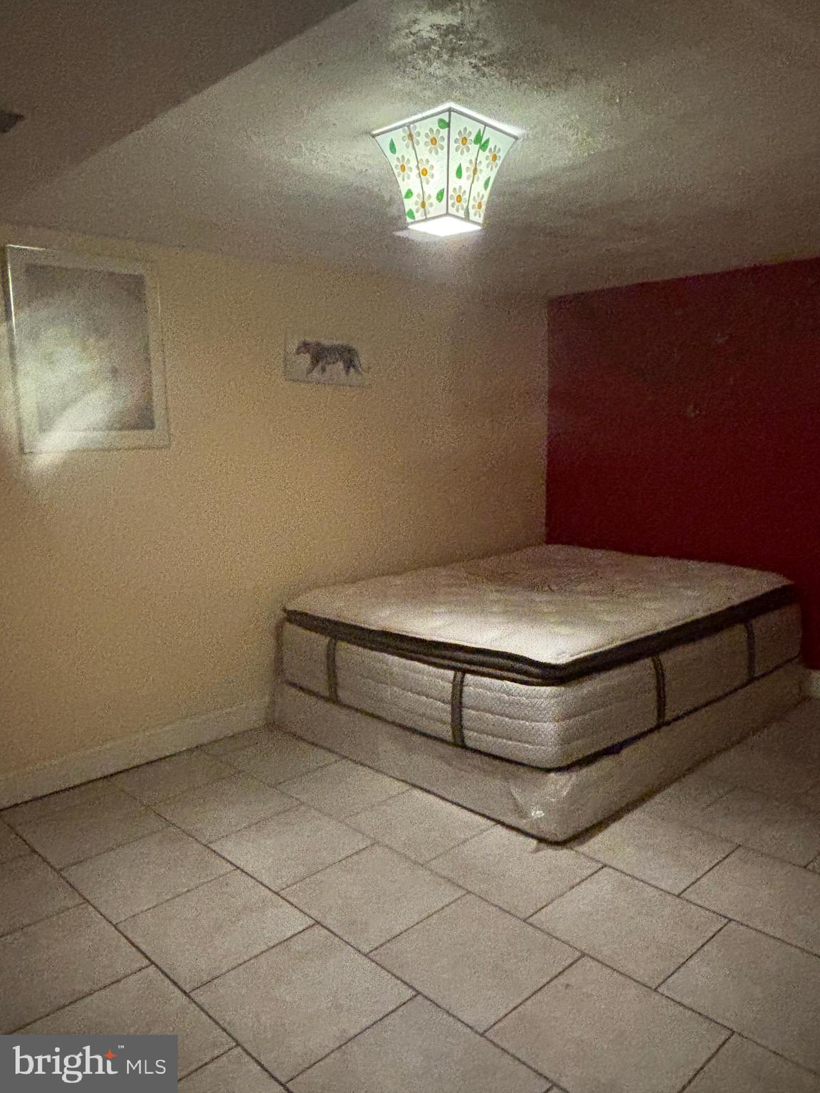 3015 Chesley Avenue Baltimore, MD 21234 - Photo 17 of 30 a room with a bench