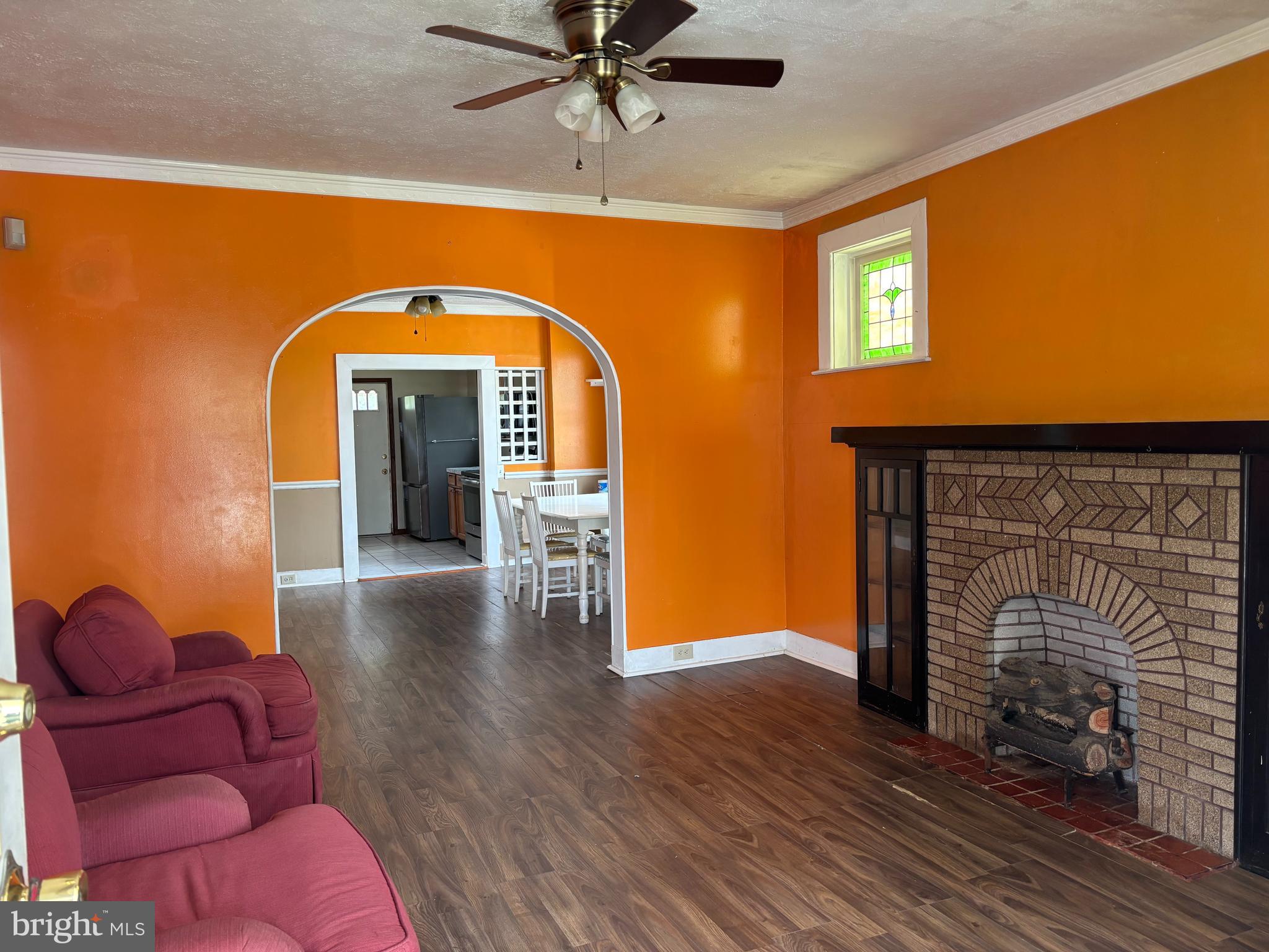 3015 Chesley Avenue Baltimore, MD 21234 - Photo 2 of 30 a view of livingroom with furniture and a fireplace