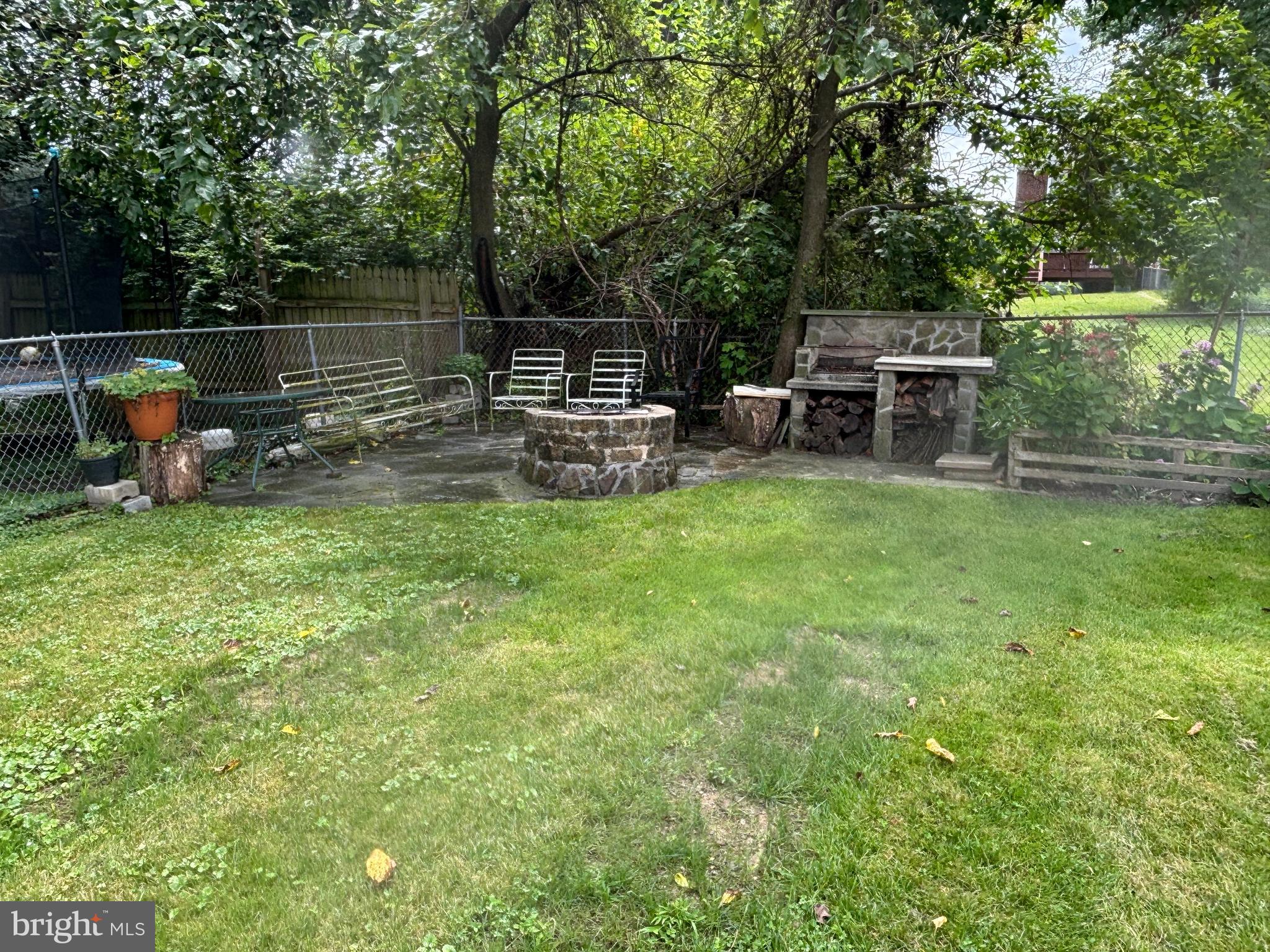 3015 Chesley Avenue Baltimore, MD 21234 - Photo 23 of 30 a view of a chair and table in the garden