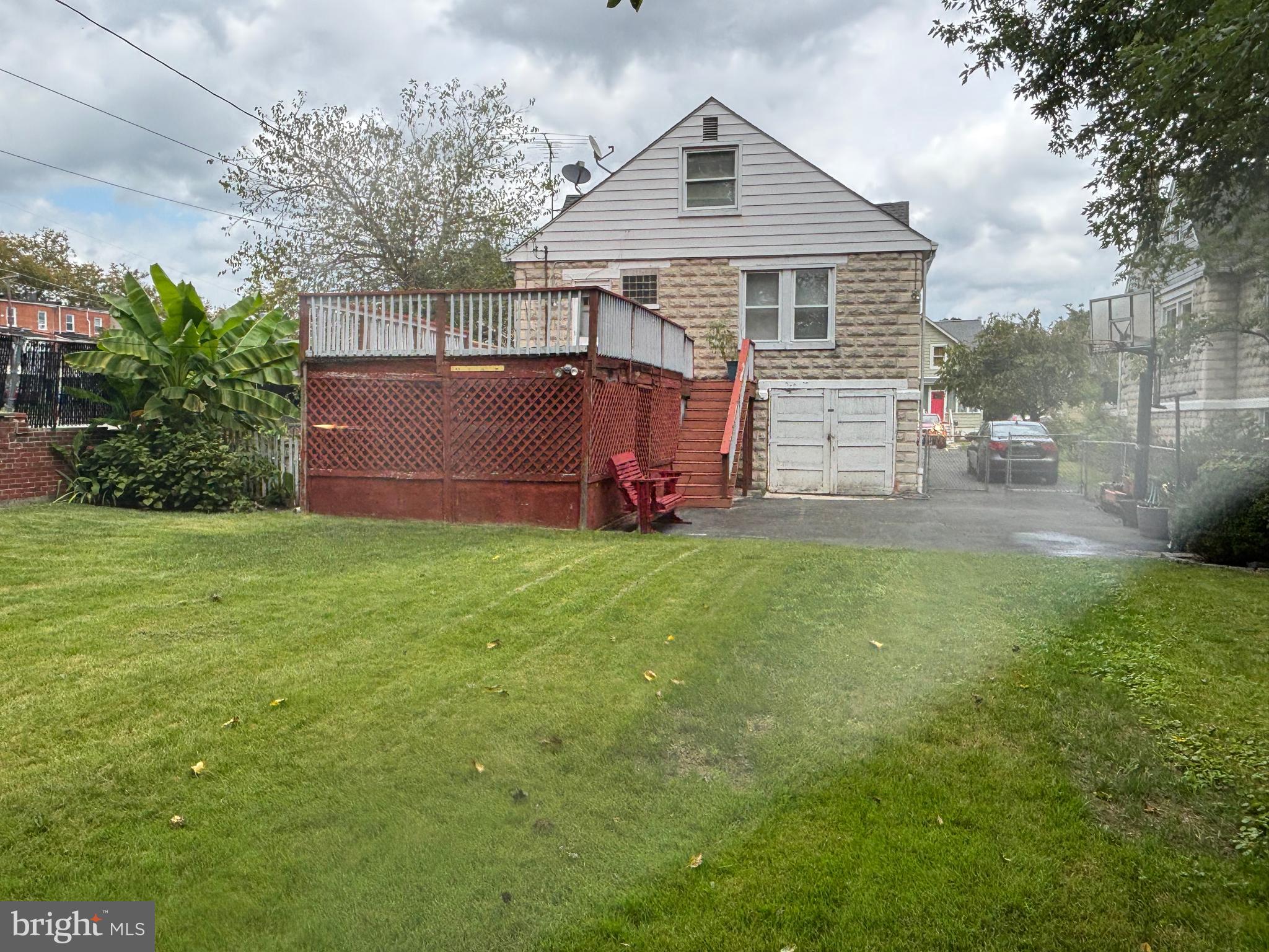 3015 Chesley Avenue Baltimore, MD 21234 - Photo 29 of 30 a view of a house with a yard and sitting area