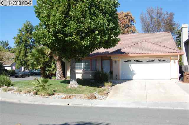 5063 Rodeo Circle Antioch, CA 94531 - Photo 1 of 1 a front view of a house with a yard and garage