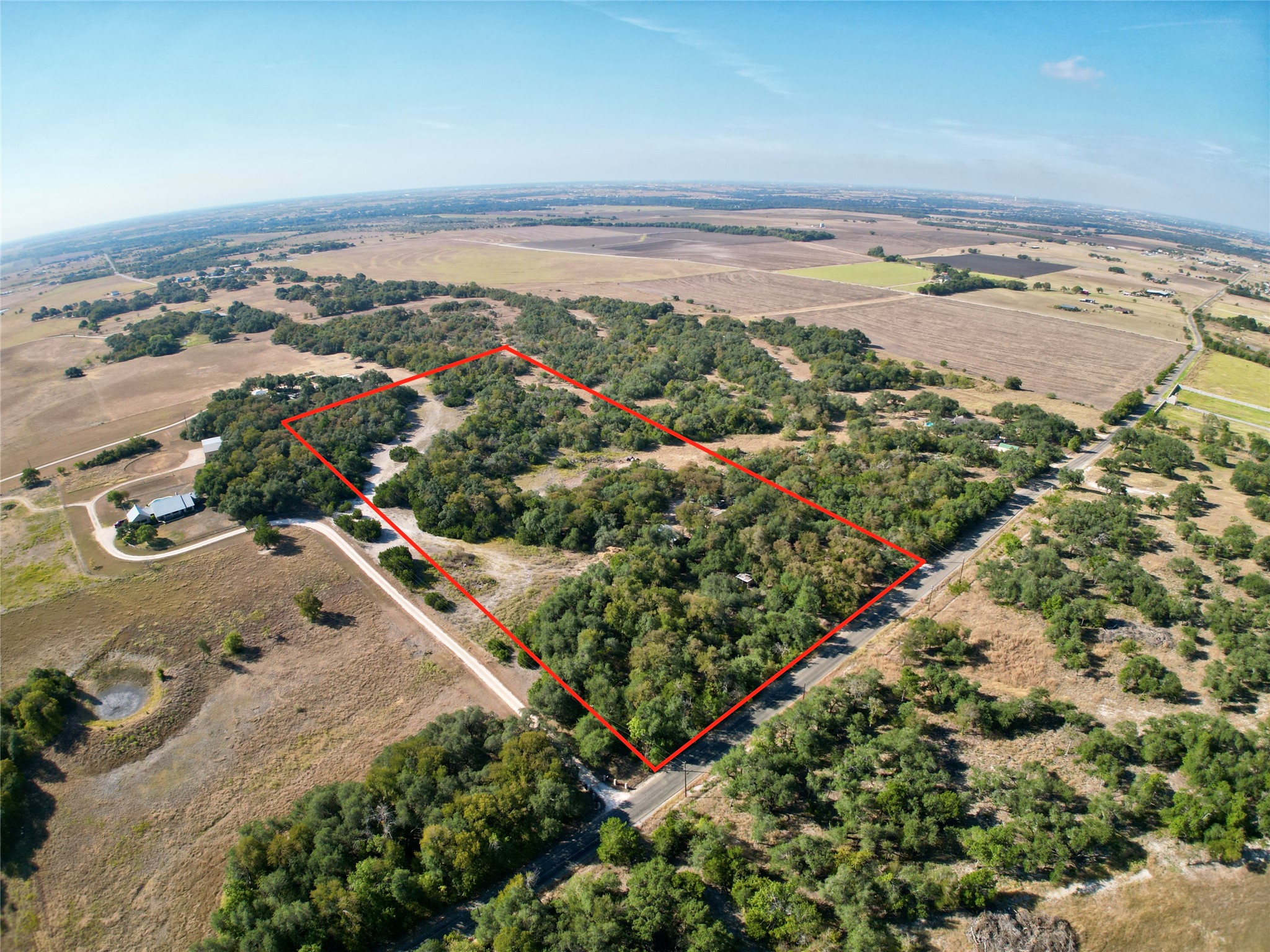 Overview of rural landscape featuring property boundaries highlighted