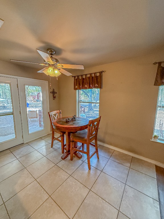500 Jim Hogg Road Georgetown, TX 78633 - Photo 21 of 37 Dining area with ceiling fan and light tile patterned floors