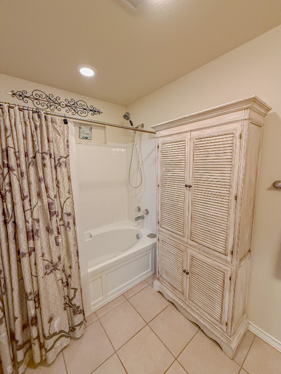 500 Jim Hogg Road Georgetown, TX 78633 - Photo 28 of 37 Full bath with tile patterned flooring, shower / bath combination with curtain, and recessed lighting