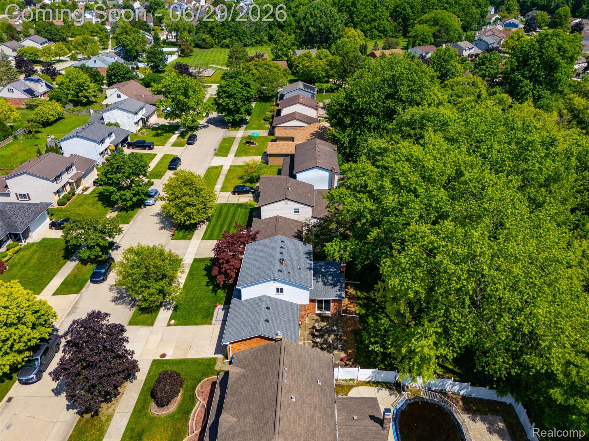 45179 Rudgate Road Canton, MI 48188 - Photo 36 of 48 Residential neighborhood featuring mature trees, manicured lawns, and paved streets