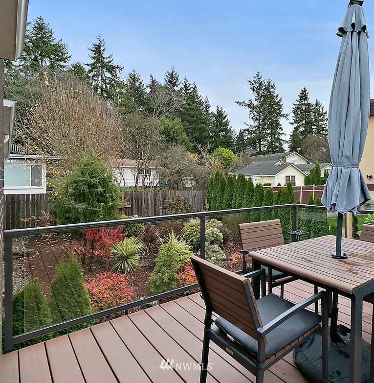 1307 South 9th Street Renton, WA 98057 - Photo 14 of 40 a view of a wooden deck with furniture
