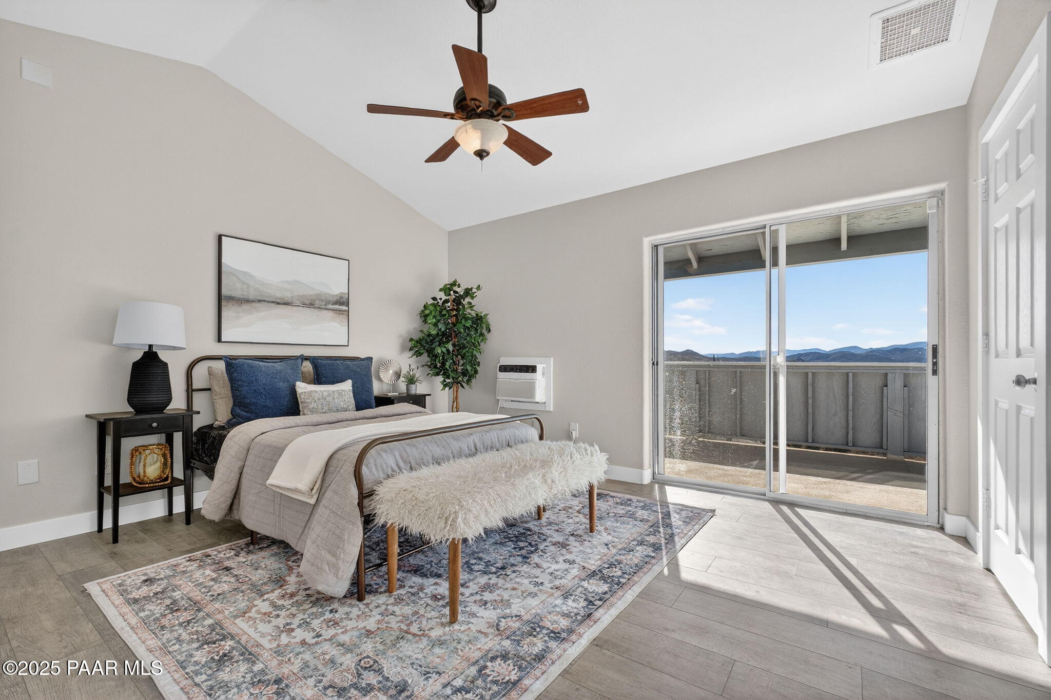 14410 East Blue Ridge Road Dewey-Humboldt, AZ 86327 - Photo 19 of 60 a bed room with a bed and a mirror