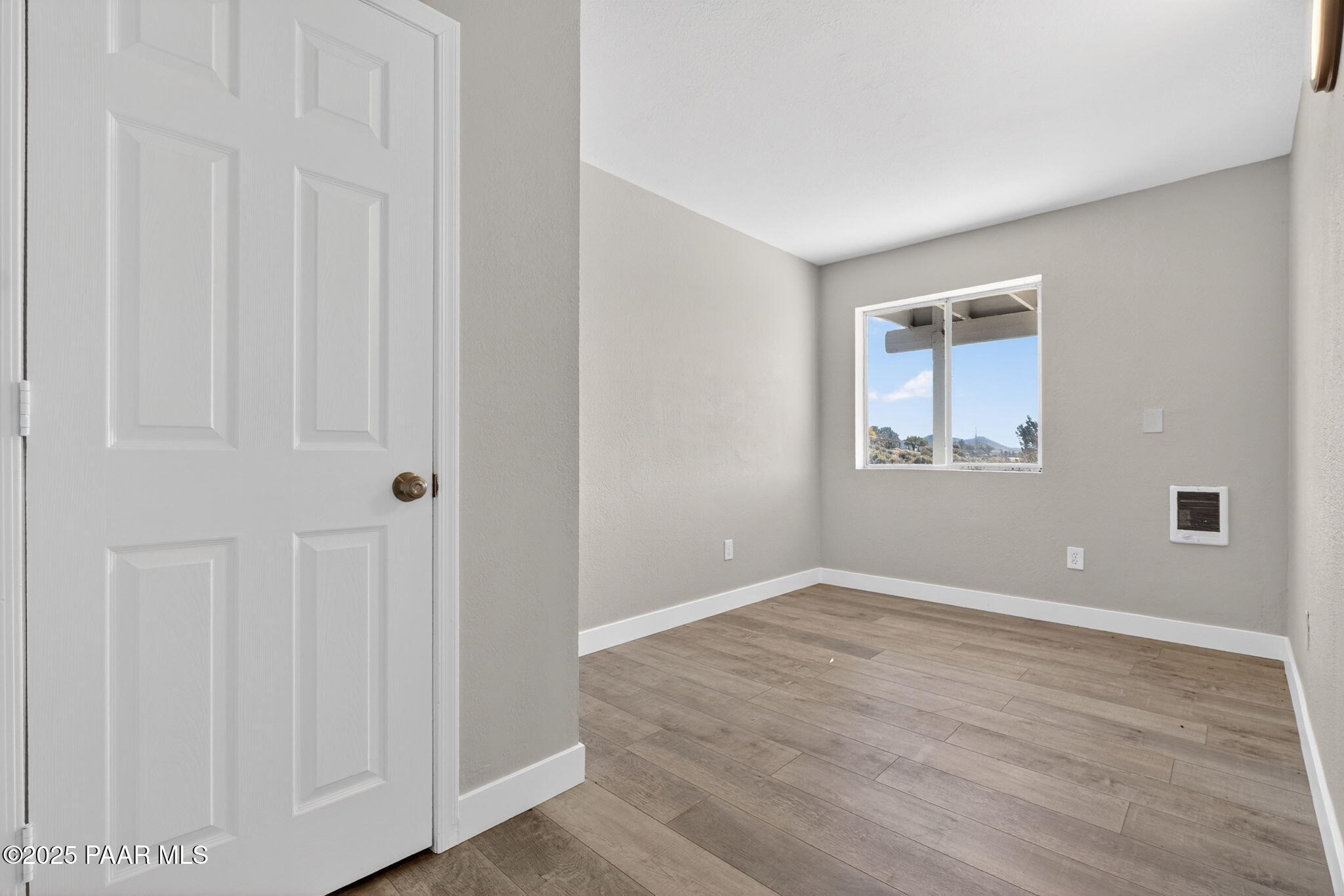 14410 East Blue Ridge Road Dewey-Humboldt, AZ 86327 - Photo 44 of 60 wooden floor in an empty room