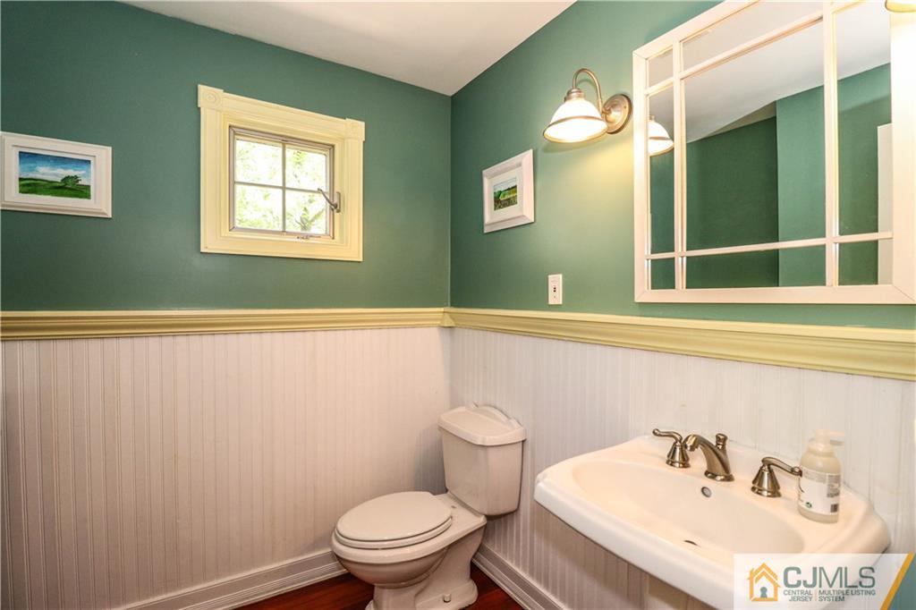 18 Maida Road Edison, NJ 08820 - Photo 22 of 25 a bathroom with a sink and a toilet