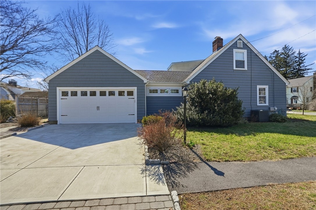 2 Duncan Road East Providence, RI 02916 - Photo 3 of 39 Another exterior view of the home on corner lot with new driveway and garage door.