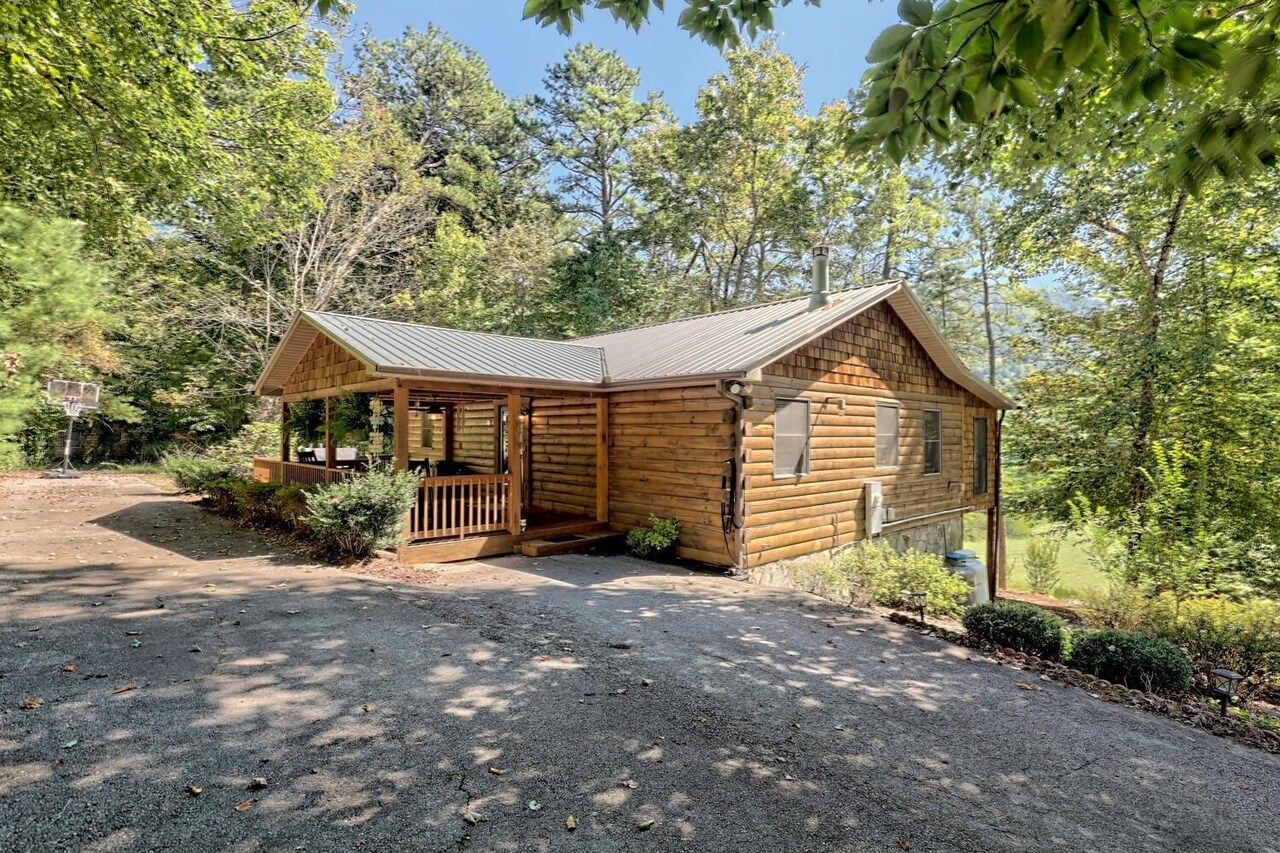 20 Walton Lane Rabun Gap, GA 30568 - Photo 1 of 1 a view of a house with backyard and garden