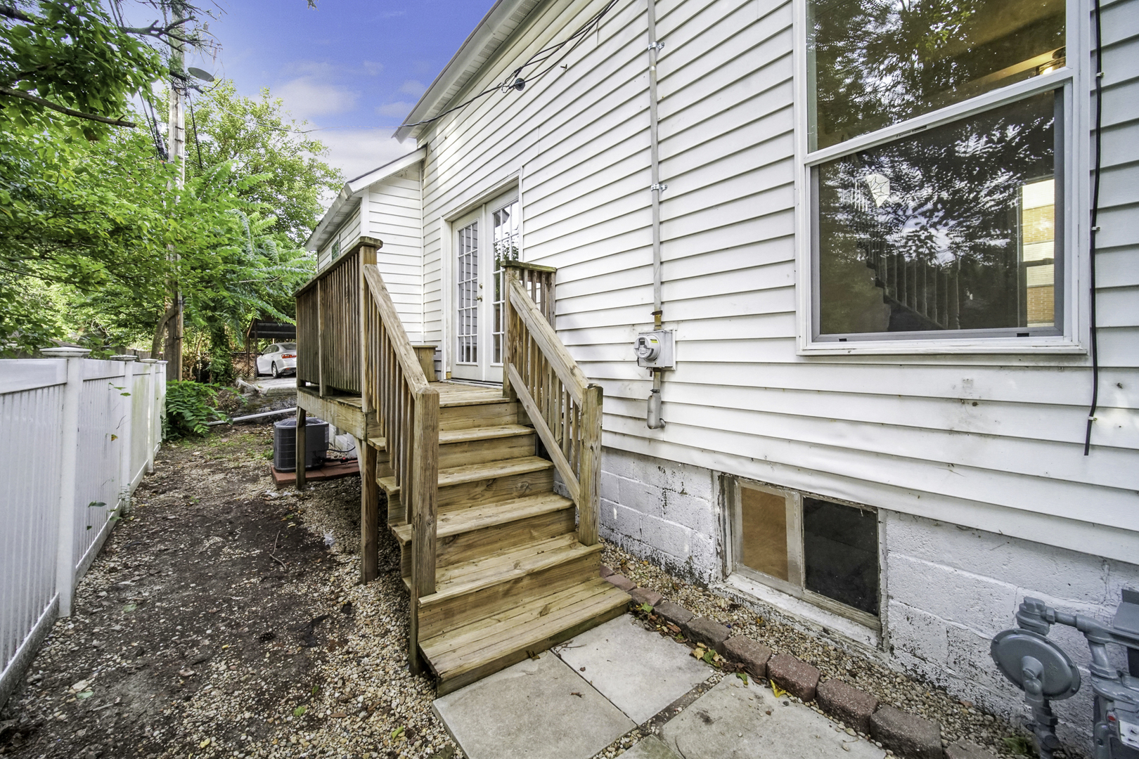 2136 Chestnut Road Homewood, IL 60430 - Photo 22 of 26 a view of a house with backyard and wooden fence
