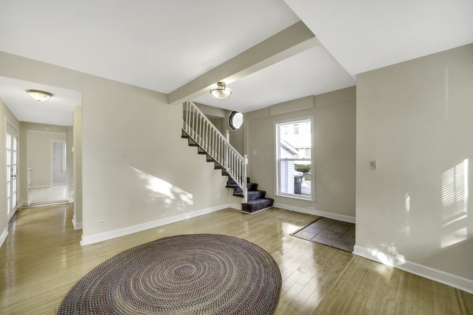 2136 Chestnut Road Homewood, IL 60430 - Photo 4 of 26 a view of entryway and hall with wooden floor