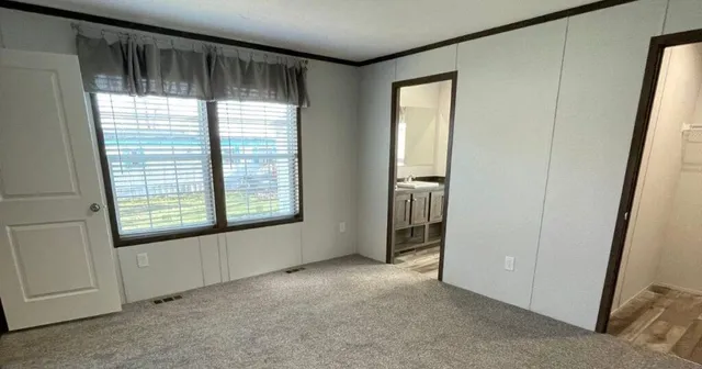 a bathroom with a sink vanity and a mirror