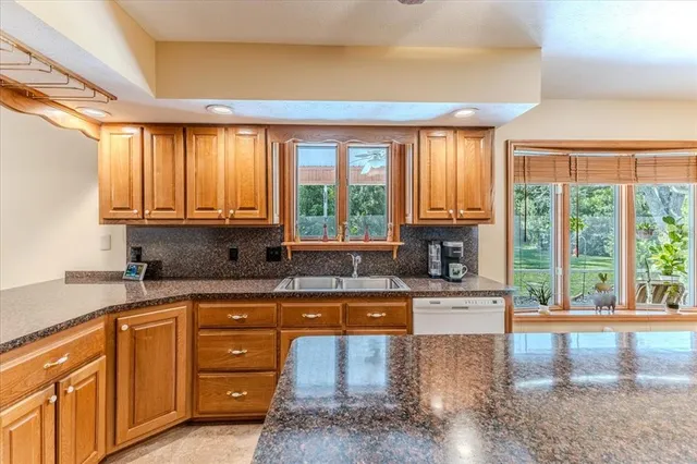a bath tub sitting next to a window