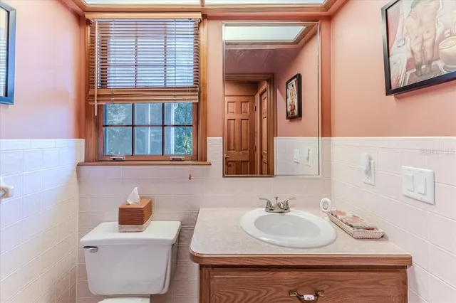 a view of a garage with rack and bicycle