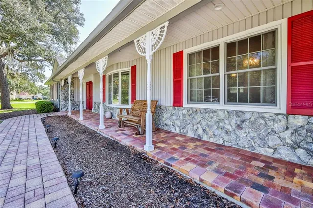 a view of a house with a big yard