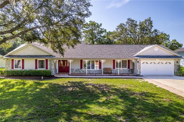 a view of a house with a big yard
