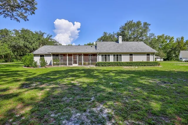 a view of kitchen with furniture and wooden floor