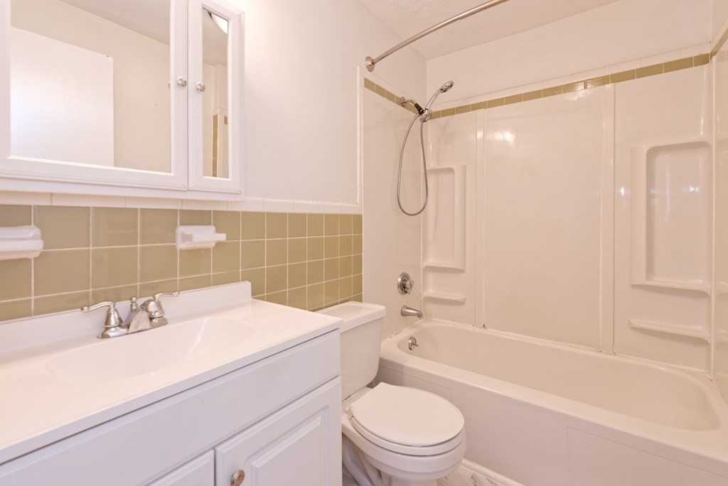176 Maple Avenue, Unit 27 Rutland, MA 01543 - Photo 9 of 19 a bathroom with a sink toilet vanity and shower