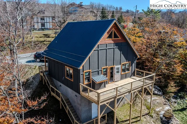a house with trees in front of it