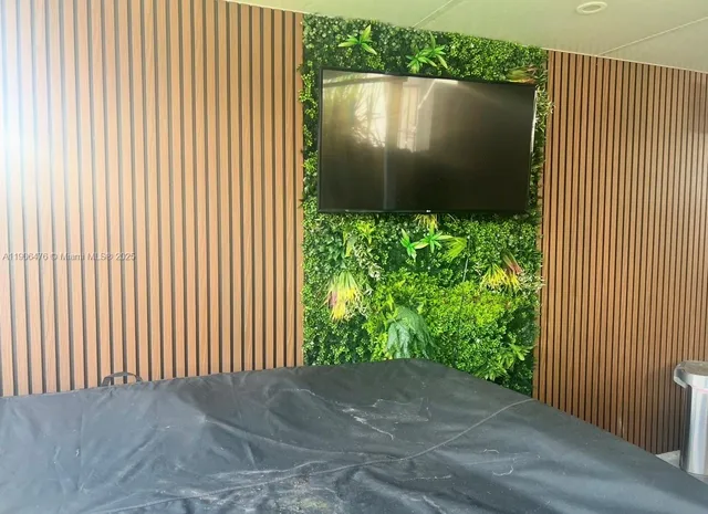 a view of a garden from a corridor