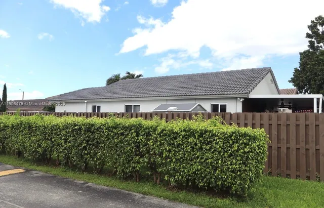 front view of a house with a big yard
