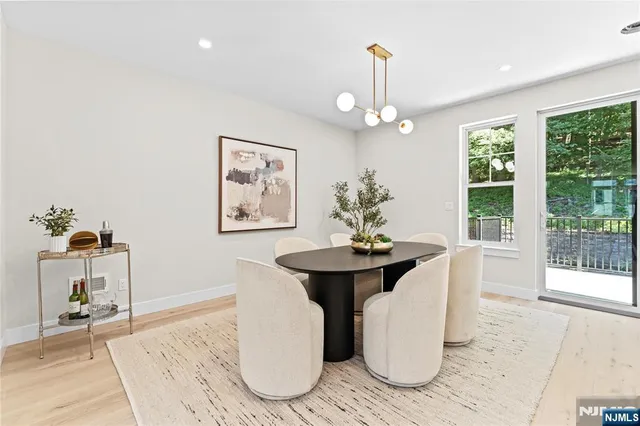 a bedroom with a bed and a chair