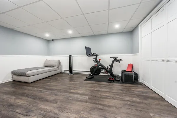 a stove top oven sitting inside of a kitchen