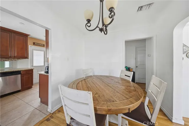 a bed room with a bed and a television