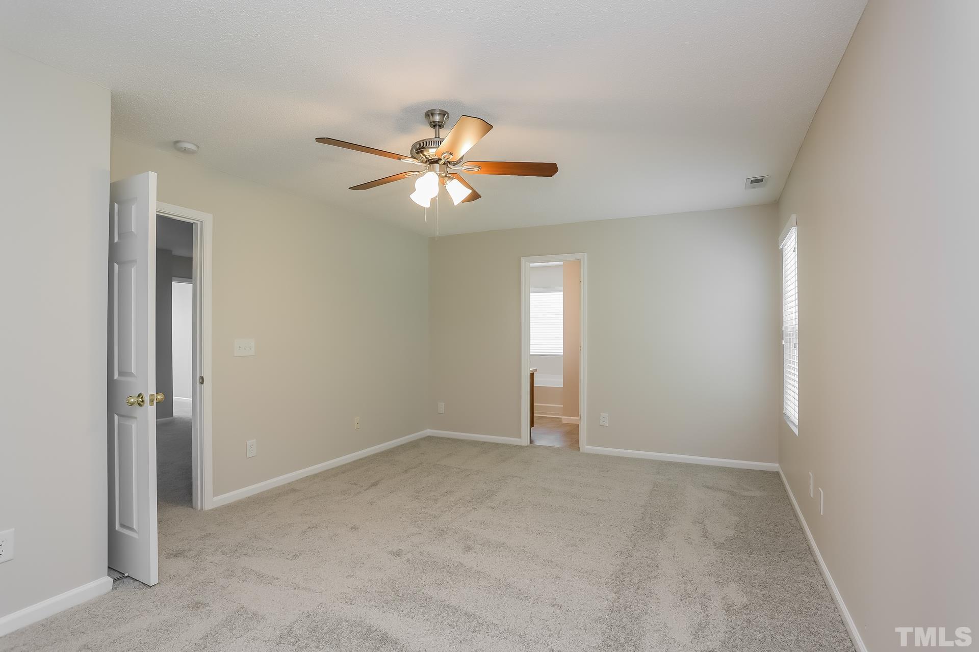 3618 Mountain Brook Circle Durham, NC 27704 - Photo 11 of 15 a view of an empty room with a window