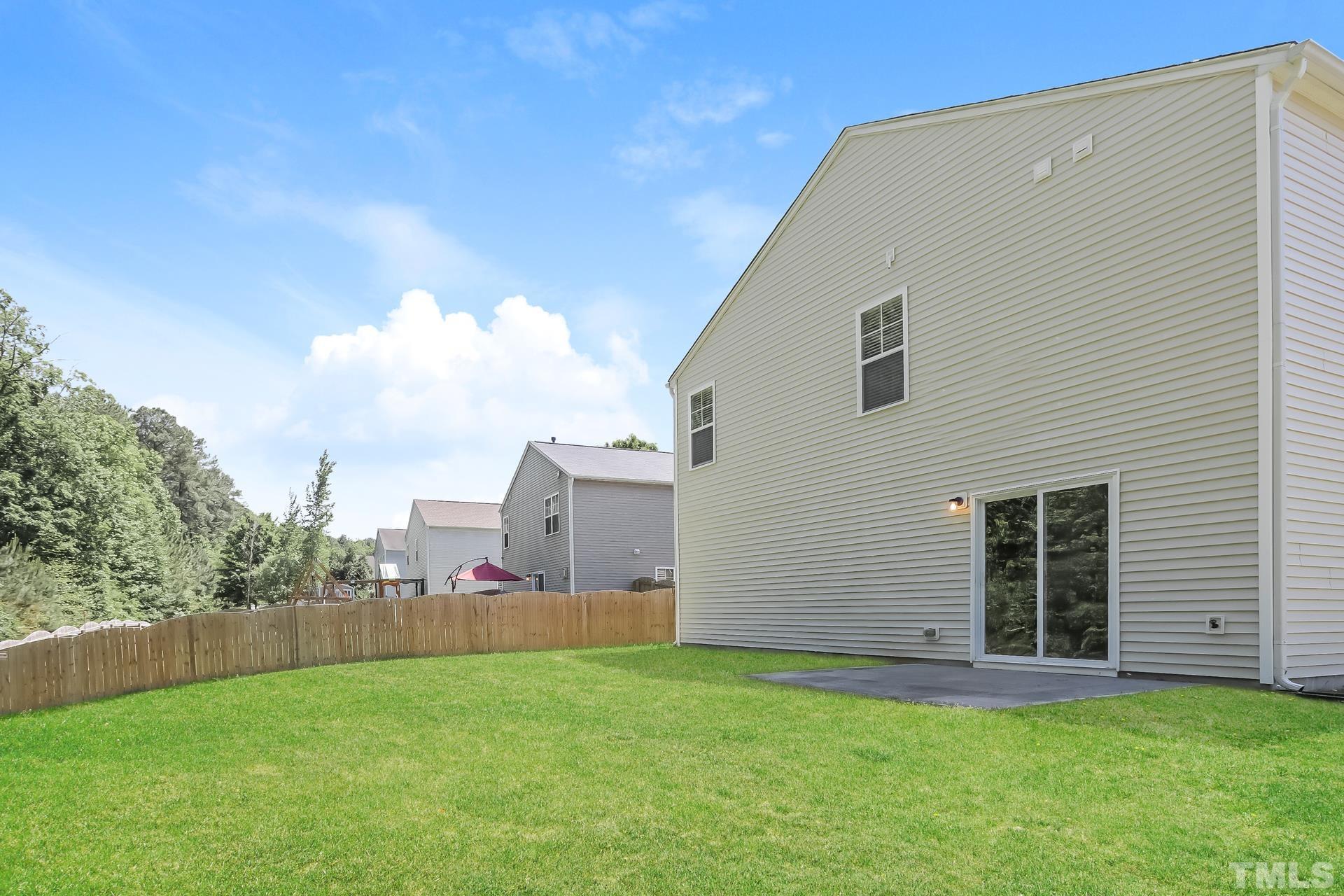 3618 Mountain Brook Circle Durham, NC 27704 - Photo 15 of 15 a view of a backyard of a house