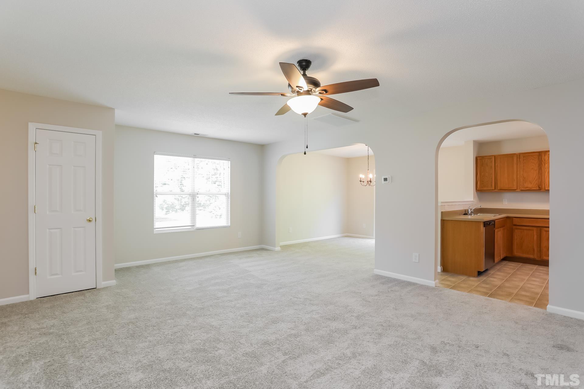3618 Mountain Brook Circle Durham, NC 27704 - Photo 5 of 15 a view of an empty room with a window