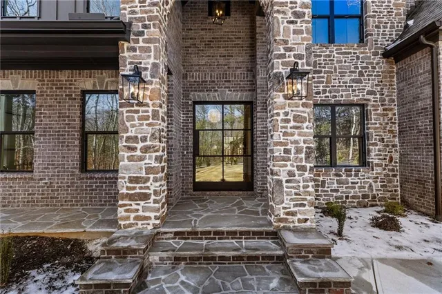 a front view of a house with windows